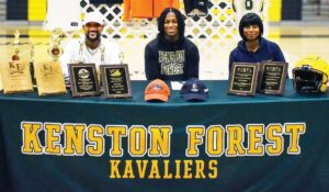 Ready For Battle Dayton Williams, Jr., shown here with his parents during last week’s signing ceremony, will play football next Fall for the Gettysburg College Bullets in Gettysburg, Pennsylvania.