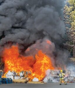 Hot Job Blackstone volunteer firefighter Kenny Davis led the attack Thursday afternoon in 94-degree temperatures behind the Walmart supercenter.