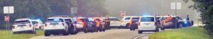 Active Scene This was the scene shortly after sunrise Saturday in Nottoway County at the intersection of Rt. 460 East and Rocky Hill Road (Rt. 153). A high speed, 100 mph police pursuit, which began on Rt. 360 in Amelia and continued down Rt. 153 into Nottoway, ended when the driver crossed both lanes of 460 and crashed into a wooded area. Police say the armed suspect fled on foot, displayed a firearm, and that shots were fired after a short foot pursuit. A Nottoway Deputy Sheriff was wounded in the hand, and a State Trooper shot and killed the suspect at approximately 5:25 a.m.