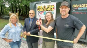 FROM LEFT: Deb Rose of the Chamber of Commerce, Mayor Lafayette Dickens, Lisa Johnson, and Joshua Johnson. Lisa & Josh own and operate The Brew House, which will celebrate its 9th anniversary downtown next month (October); and Trippin’ Billies Brewery, which they opened in October 2024 at the corner of East Broad Street & South High Streets.